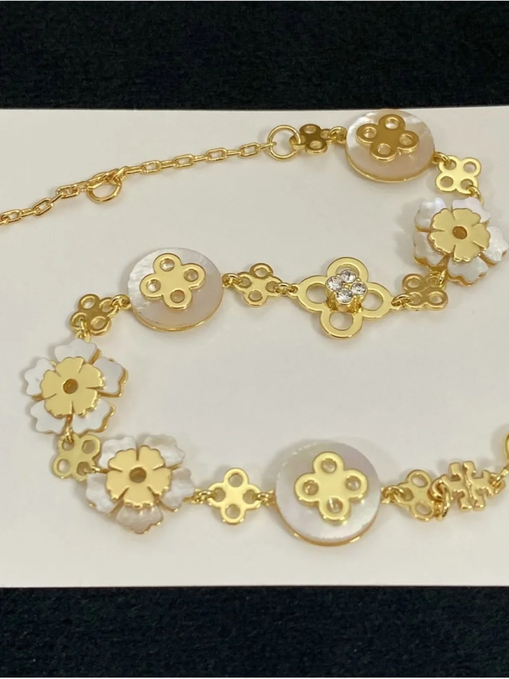 Tory Burch Gold and White Floral Shell Link Bracelet